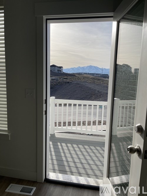 A view of a house from a doorway.