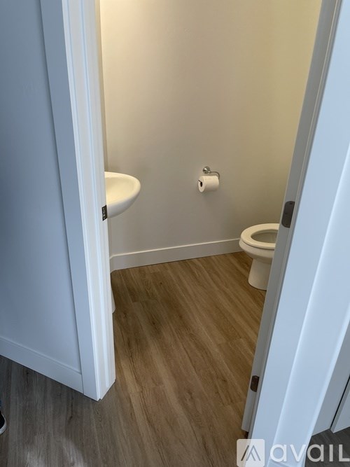 A bathroom with a toilet and a bidet.