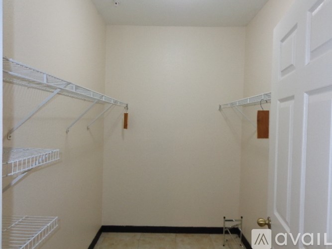 A white door is on the right side of the image.