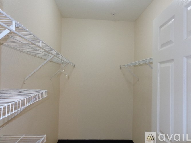 A white door is on the right side of the image.