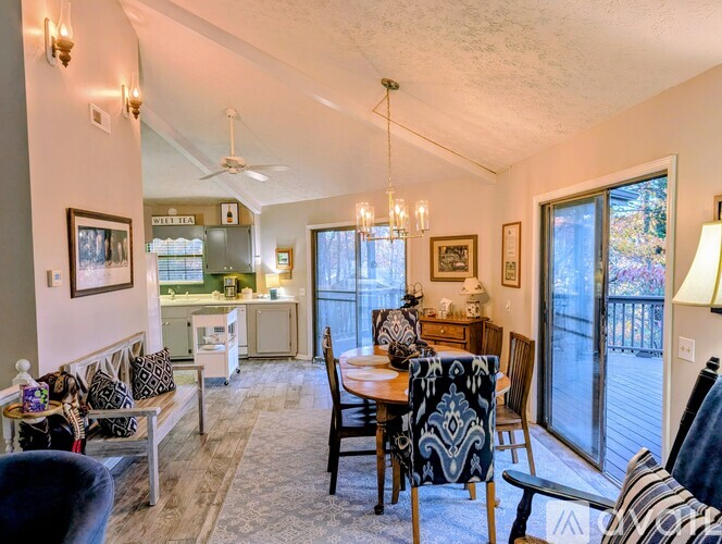 A well-lit dining area with a table set for four.