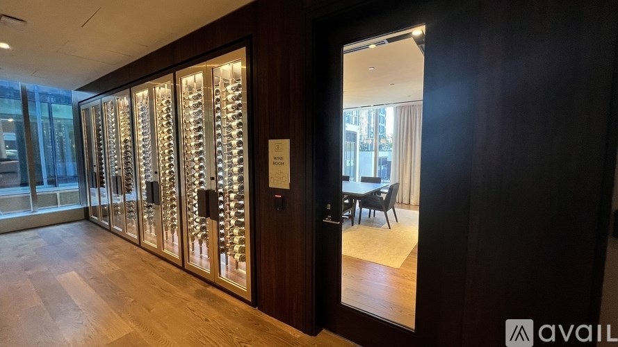 A room with a glass door and a sign on it.