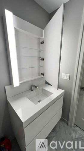 A bathroom sink with a mirror above it.