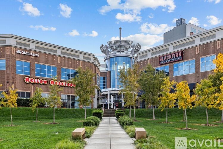 A large building with a glass entrance and a sign that says Black Friday.