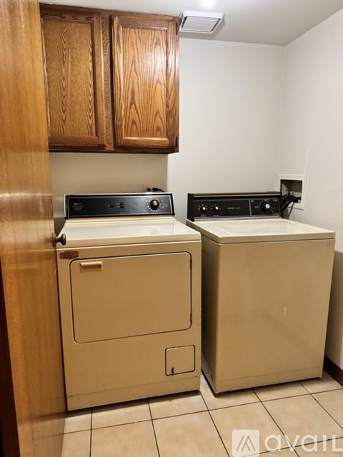A small kitchen with a stove and a dishwasher.