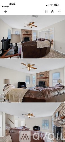 A bedroom with a large bed and a fireplace.