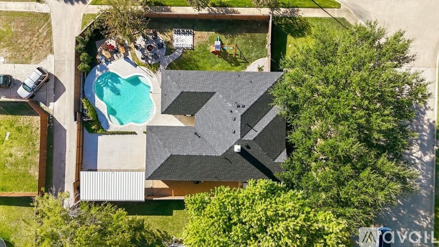 A house with a pool in the backyard.