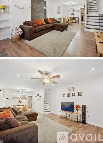 A living room with a brown couch and a television.