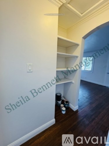 A room with a wall that says Sheila Bennett Management.