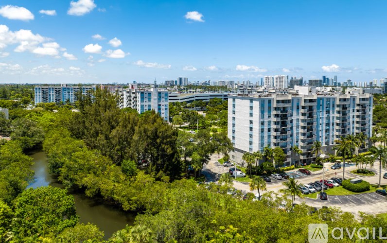 A bird's eye view of a city with a river running through it.