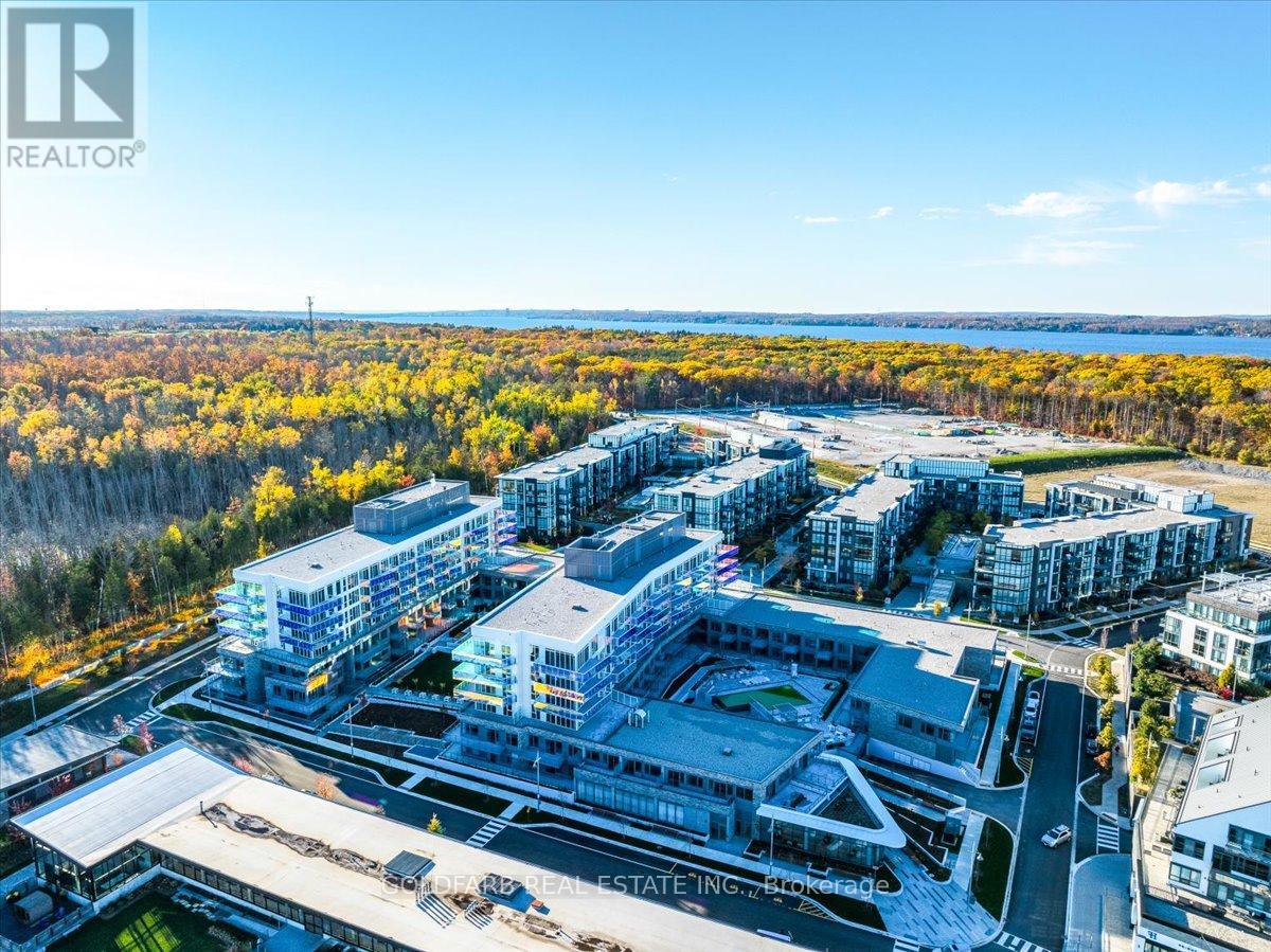 A bird's eye view of a real estate company's property with buildings and roads.