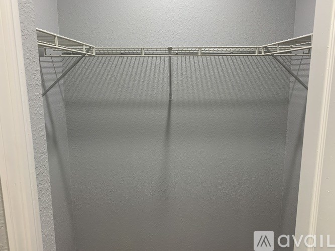 Empty clothes hanger in a closet.