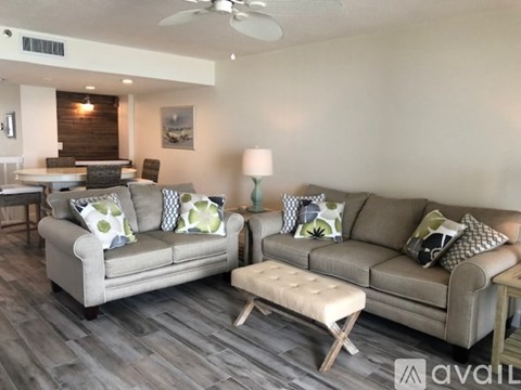A living room with two couches and a coffee table.
