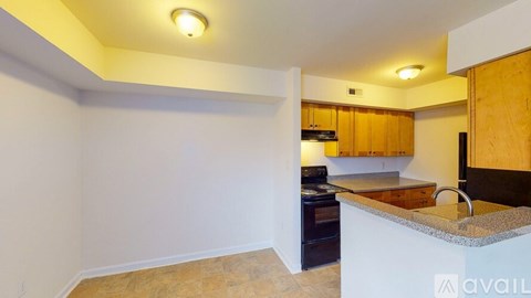 A kitchen with a countertop and cabinets.