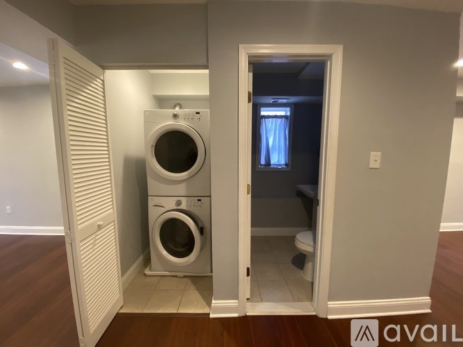 A washer and dryer in a small room.