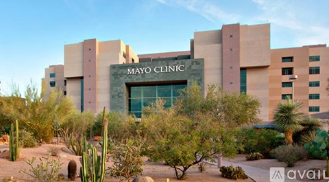 A modern building with the name "MAYO CLINIC" on it.
