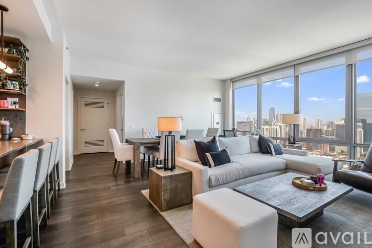 A modern living room with a view of the city.