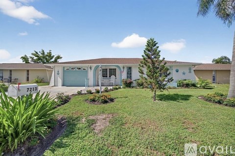 A sunny day at the Avila apartments with a clear blue sky.