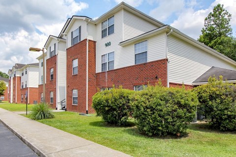 Apartment building with the number 900 on the side.