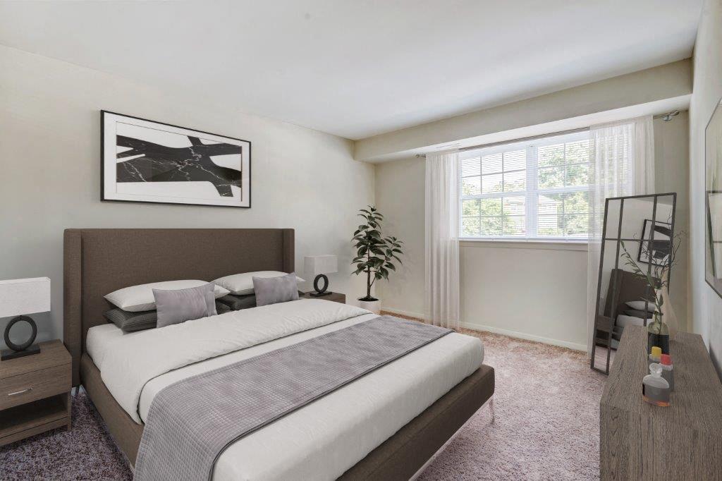 Staged bedroom with large window
