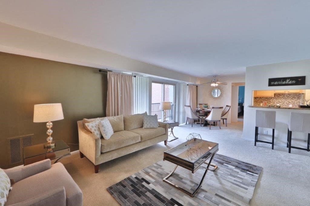 a living room with a couch and a table