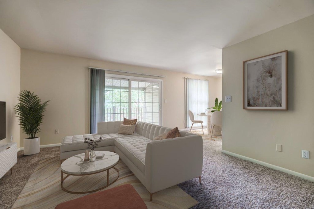 a living room with a couch and a coffee table