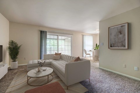 a living room with a couch and a coffee table