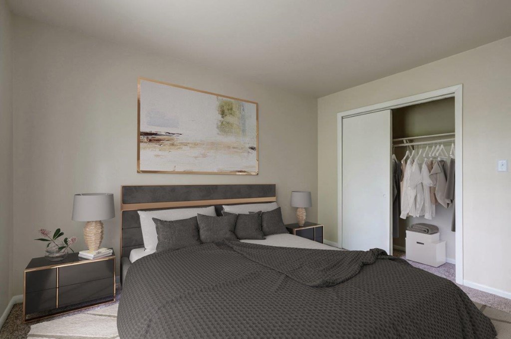 a bedroom with a large bed and a closet