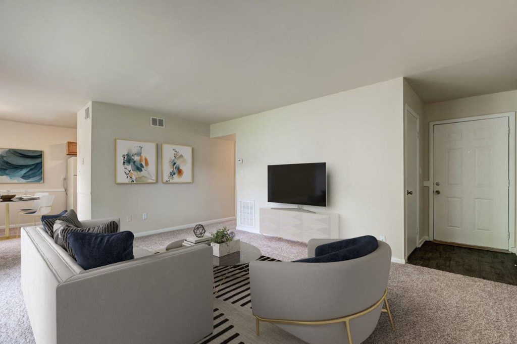 a living room with a couch and a television