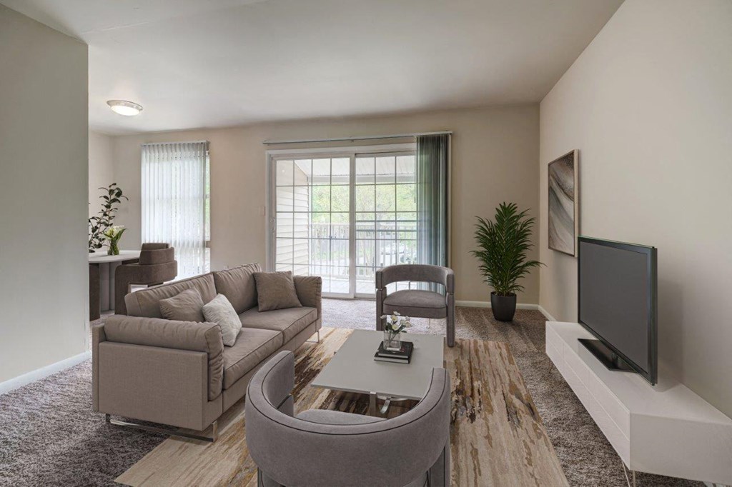 a living room with a couch and a tv