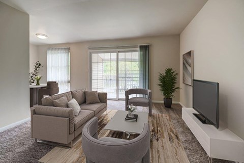 a living room with a couch and a tv