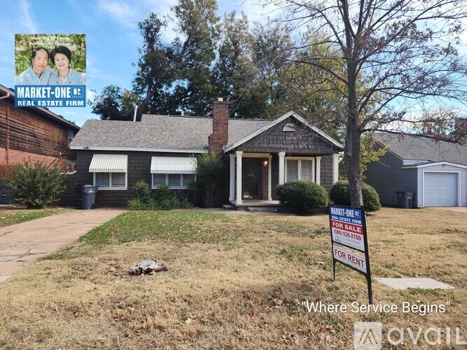 A house with a sign that says Market One.