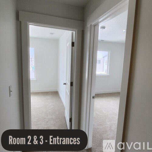 Two open doors leading to rooms in a house.