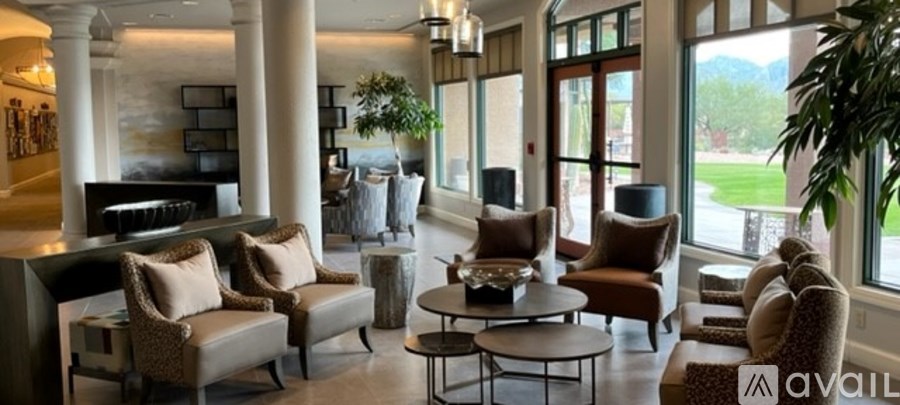 A living room with a piano and a couch.