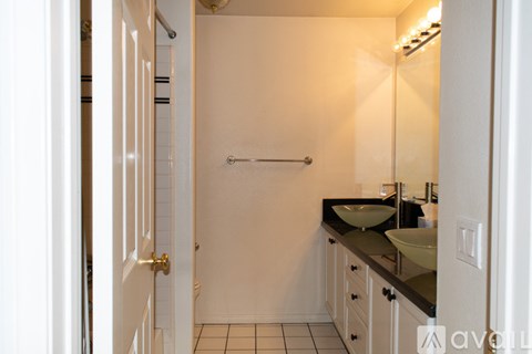 A small bathroom with a sink and a toilet.