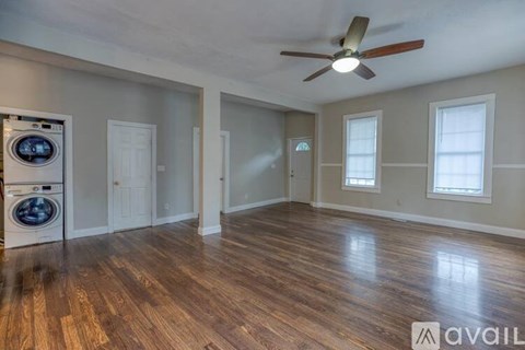 A room with a washer and dryer in it.