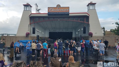 A Budweiser Amphitheater sign is displayed on a building.