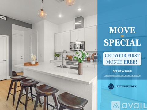 A kitchen with a counter and bar stools is advertised with a "Move in Special" offer.