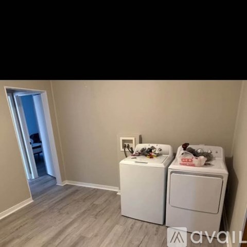 A laundry room with a washer and dryer.