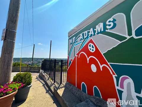 A mural on a wall with the word "MIZADAMS" written on it.