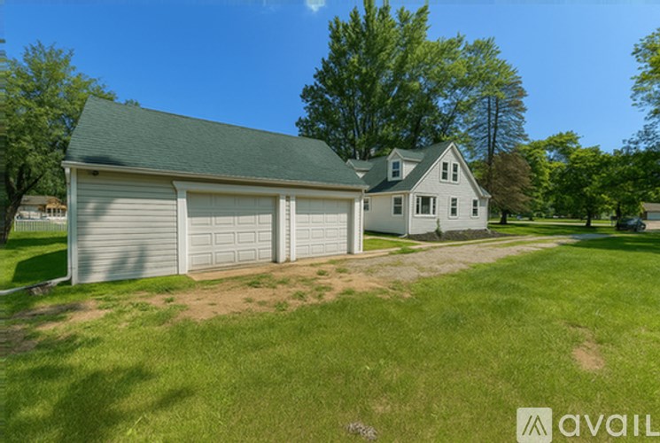 A two-car garage is attached to a house.