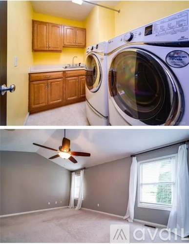A washing machine and dryer in a laundry room.