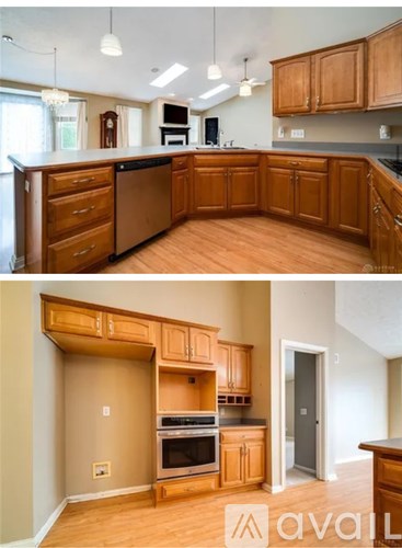 A kitchen with wooden cabinets and a countertop.