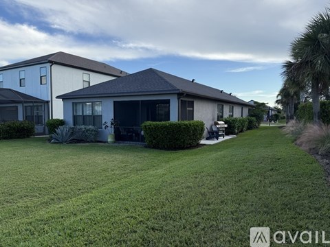 A house with a lawn in front of it.