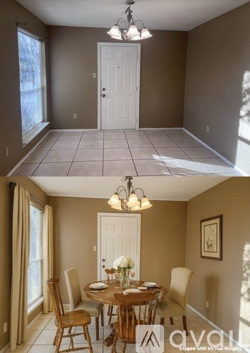 A dining room with a table set for four.