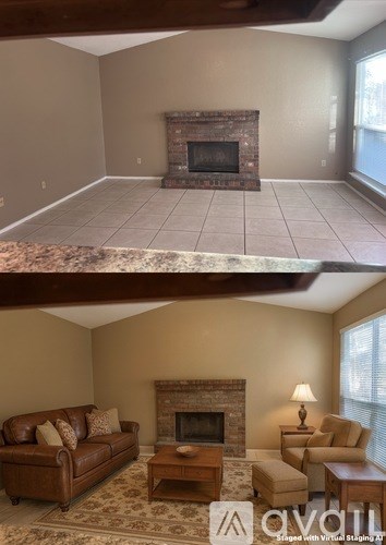 A living room with a fireplace and a couch.