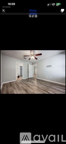 A house with a garden in front of it.