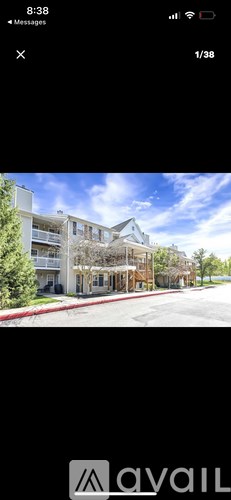 A building with a red curb in front of it.