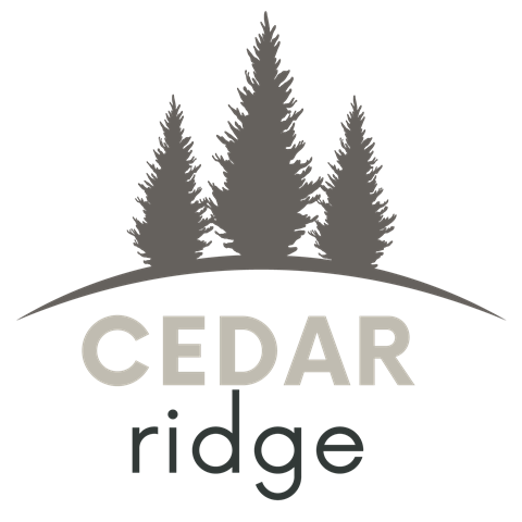 A logo with trees and the words Cedar Ridge.