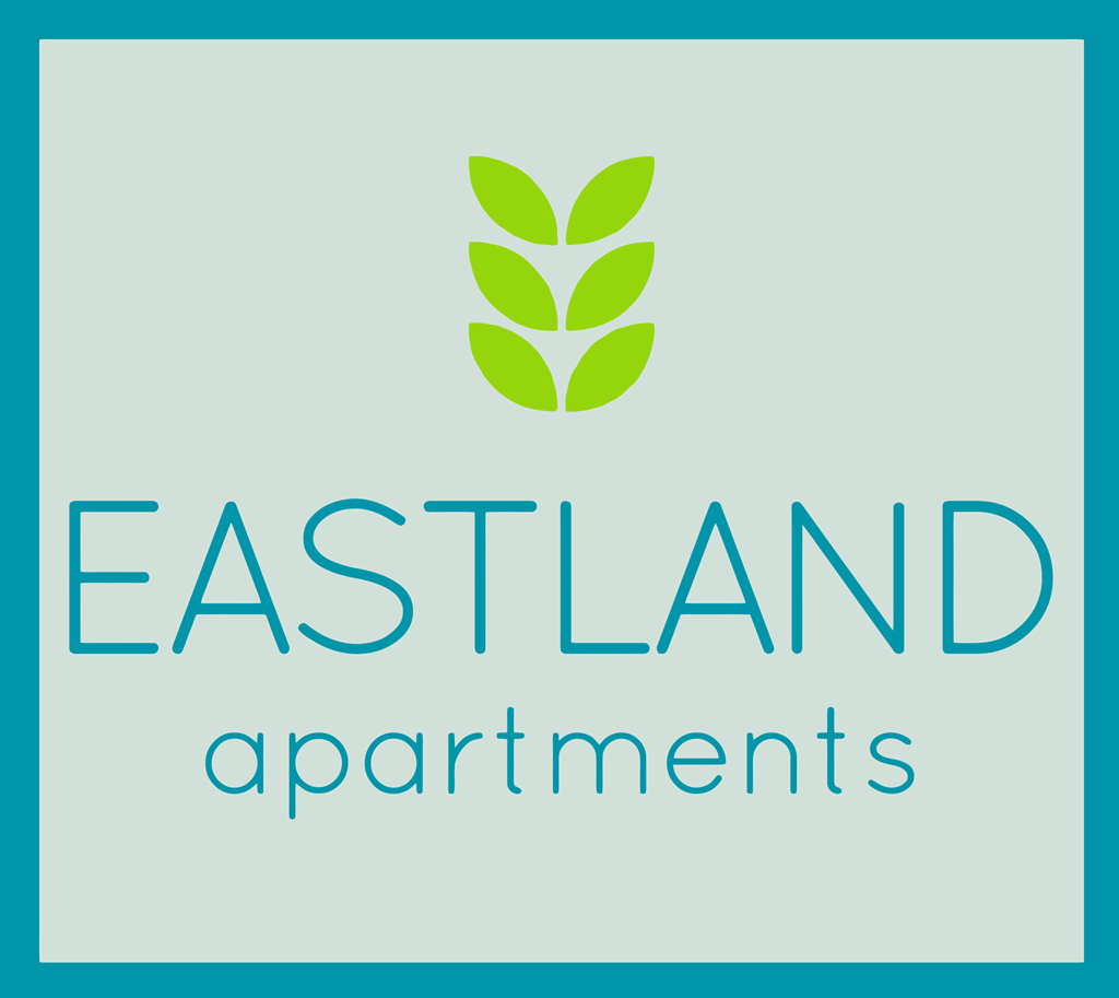 A logo for Eastland Apartments featuring a green leaf.